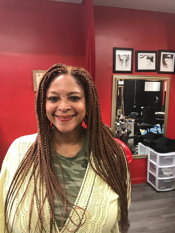 Long auburn box braids