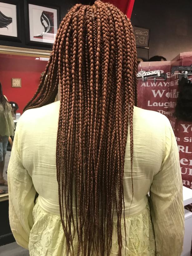 Waist-length copper box braids