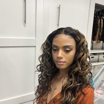Curly install with honey highlights